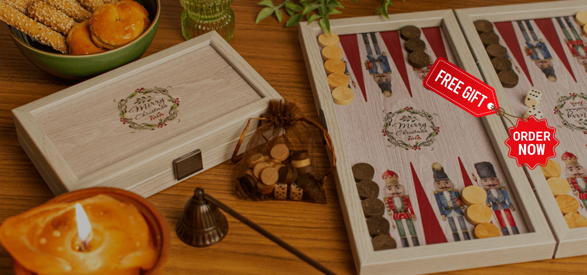 Christmas-themed travel-size and small-size backgammon sets on a festive background with holiday decorations, showcasing the exclusive Christmas Edition Backgammon design.1621243260e1af0c20-0